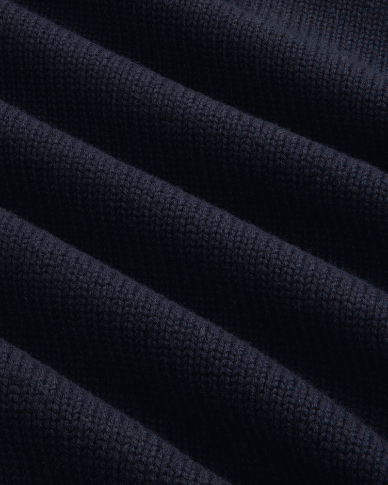 Close-up of Regatta Embroidered Crewneck Sweater’s ribbed knit fabric, highlighting its texture and softness.