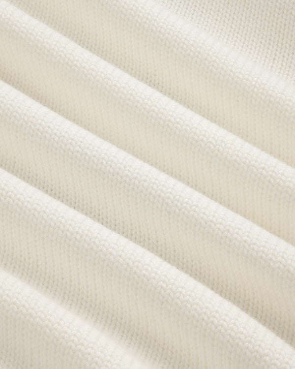 Close-up of the Regatta Embroidered Crewneck Sweater’s soft, ribbed white knit with visible textured details.