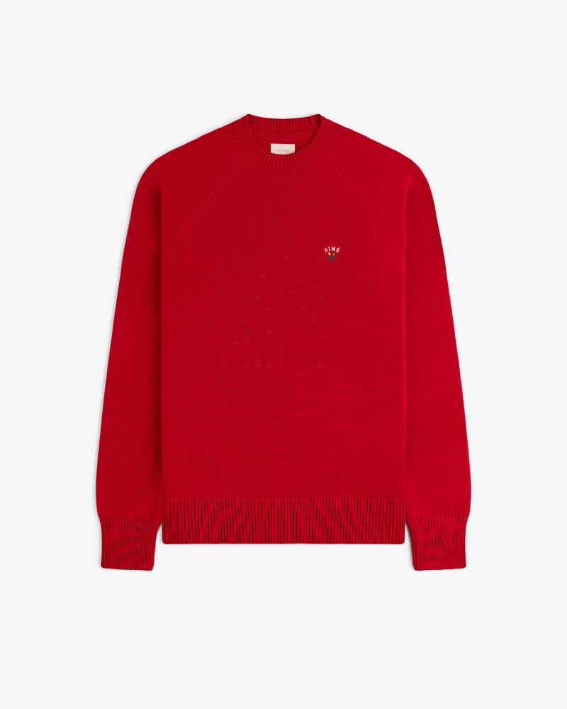 Crest Raglan Sweater: Plain red knit, long sleeves, small embroidered logo on left chest.