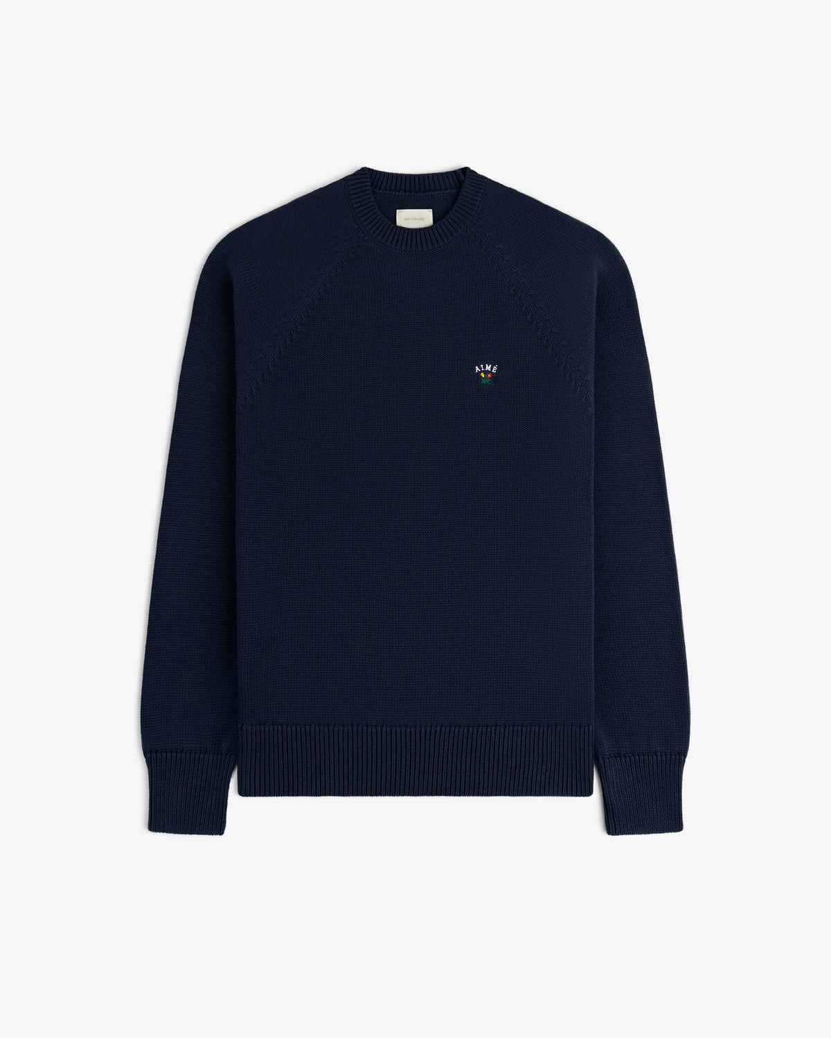 Crest Raglan Sweater in navy with small chest logo, crewneck style, shown on a plain white background.
