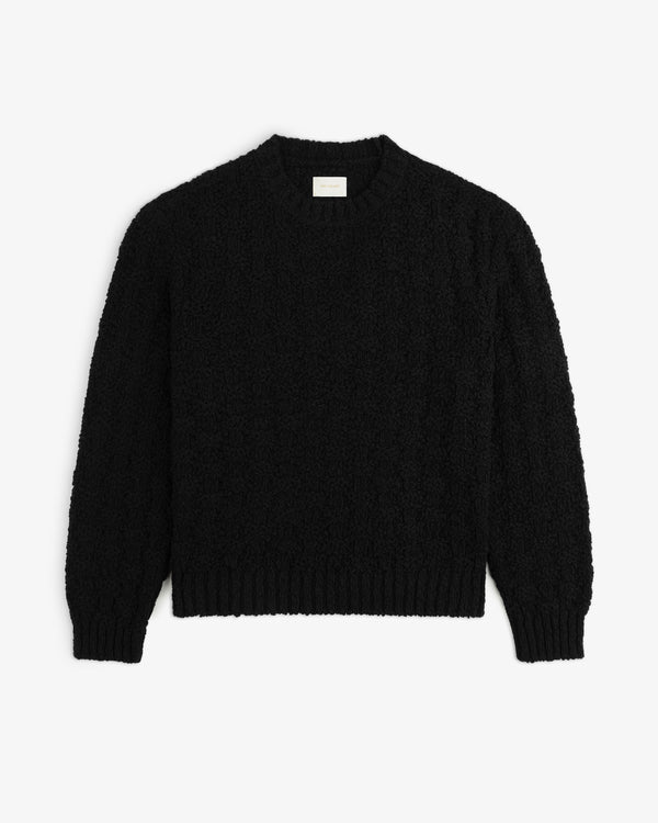 Black Checkerboard Bouclé sweater with a long-sleeved, textured, looped knit and ribbed cuffs and hem.
