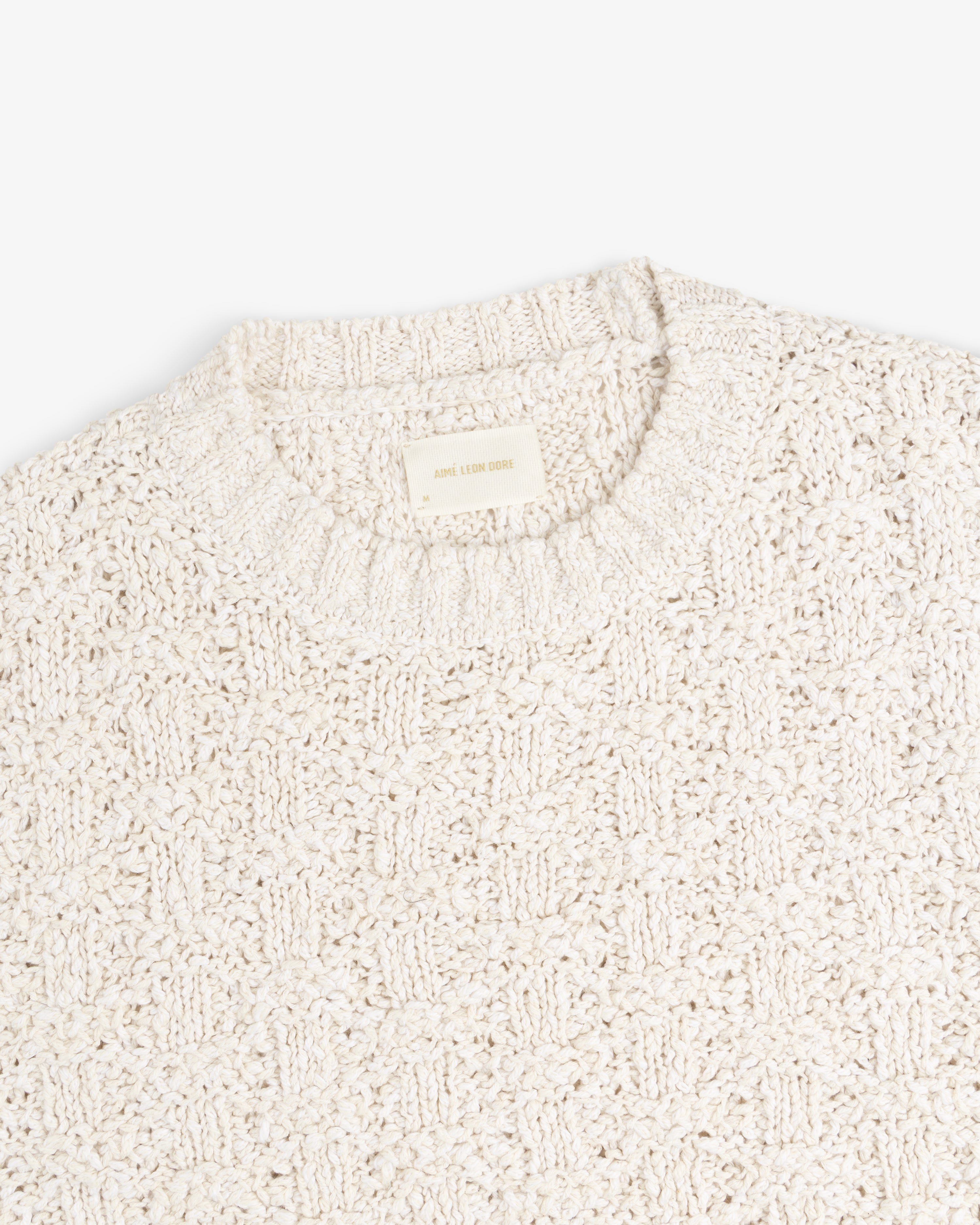 Off-white Checkerboard Bouclé Sweater with a textured checkerboard knit pattern.