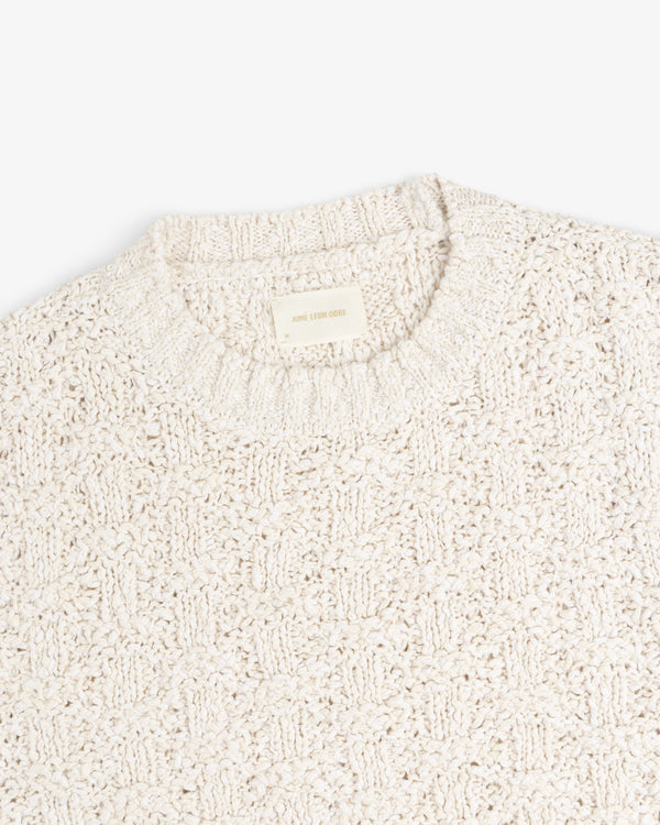 Off-white Checkerboard Bouclé Sweater with a textured checkerboard knit pattern.