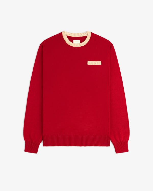 Knit Pocket Crewneck Sweater in red with a contrasting cream ribbed collar and a small chest pocket.