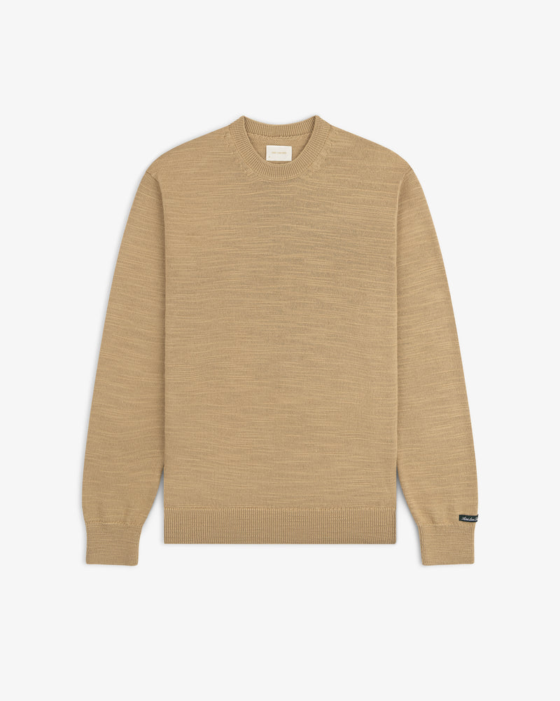Slub Merino Wool Sweater in tan with a textured knit finish and ribbed cuffs.