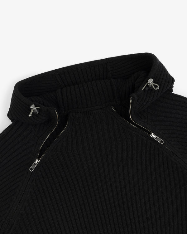 Black Wool Ribbed Knit Hoodie with a high neck, silver zipper closures, and drawstring hood toggles.