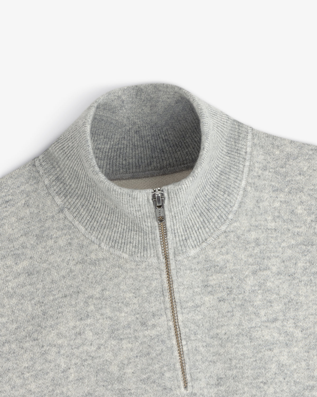 Light gray Pavilion Cashmere Pullover with a ribbed mock neck and quarter-zip silver front.