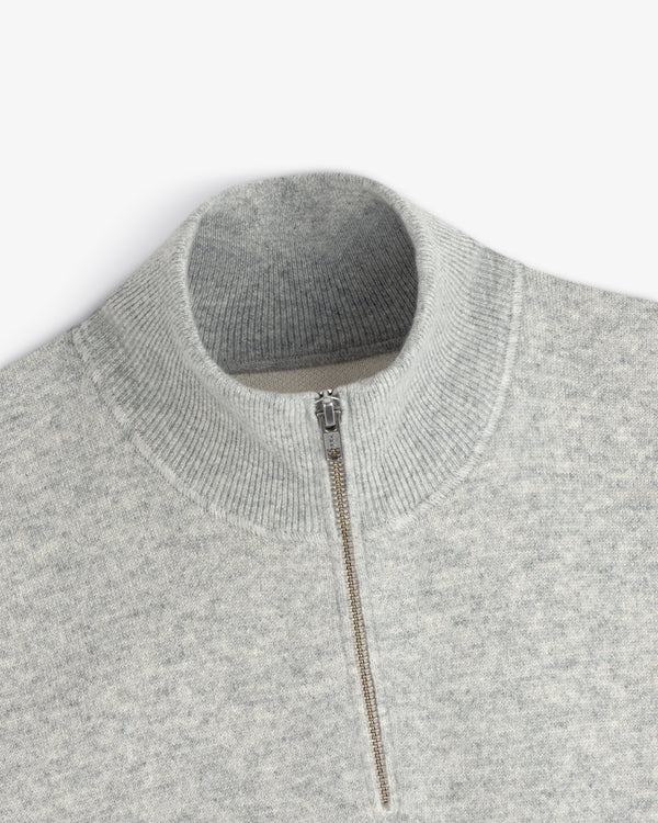 Light gray Pavilion Cashmere Pullover with a ribbed mock neck and quarter-zip silver front.