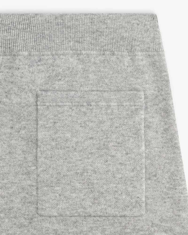 Close-up of the Pavilion Cashmere Sweatpant’s pocket, featuring a ribbed waistband and soft, textured fabric.