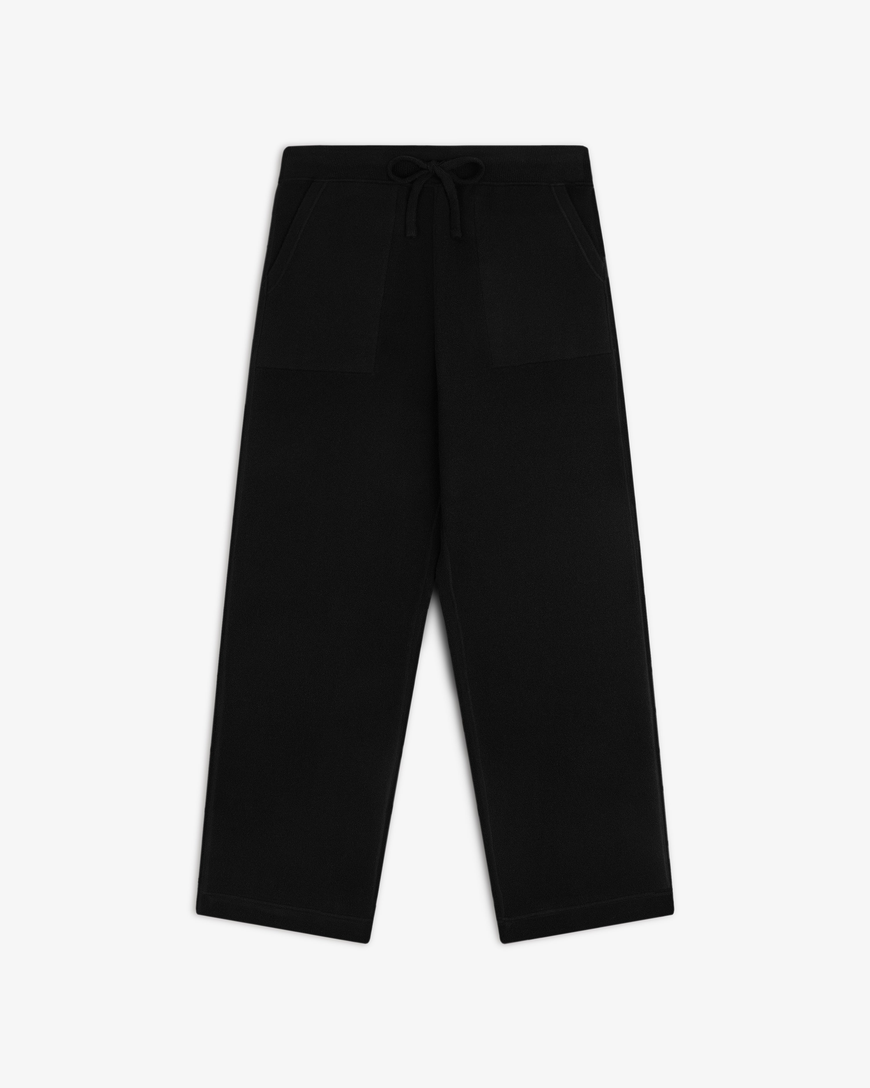 Pavilion Cashmere Sweatpant in black with wide legs, front pockets, and a drawstring waist on white background.