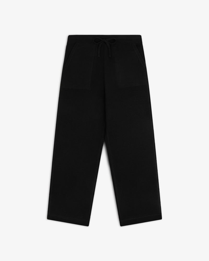 Pavilion Cashmere Sweatpant in black with wide legs, front pockets, and a drawstring waist on white background.