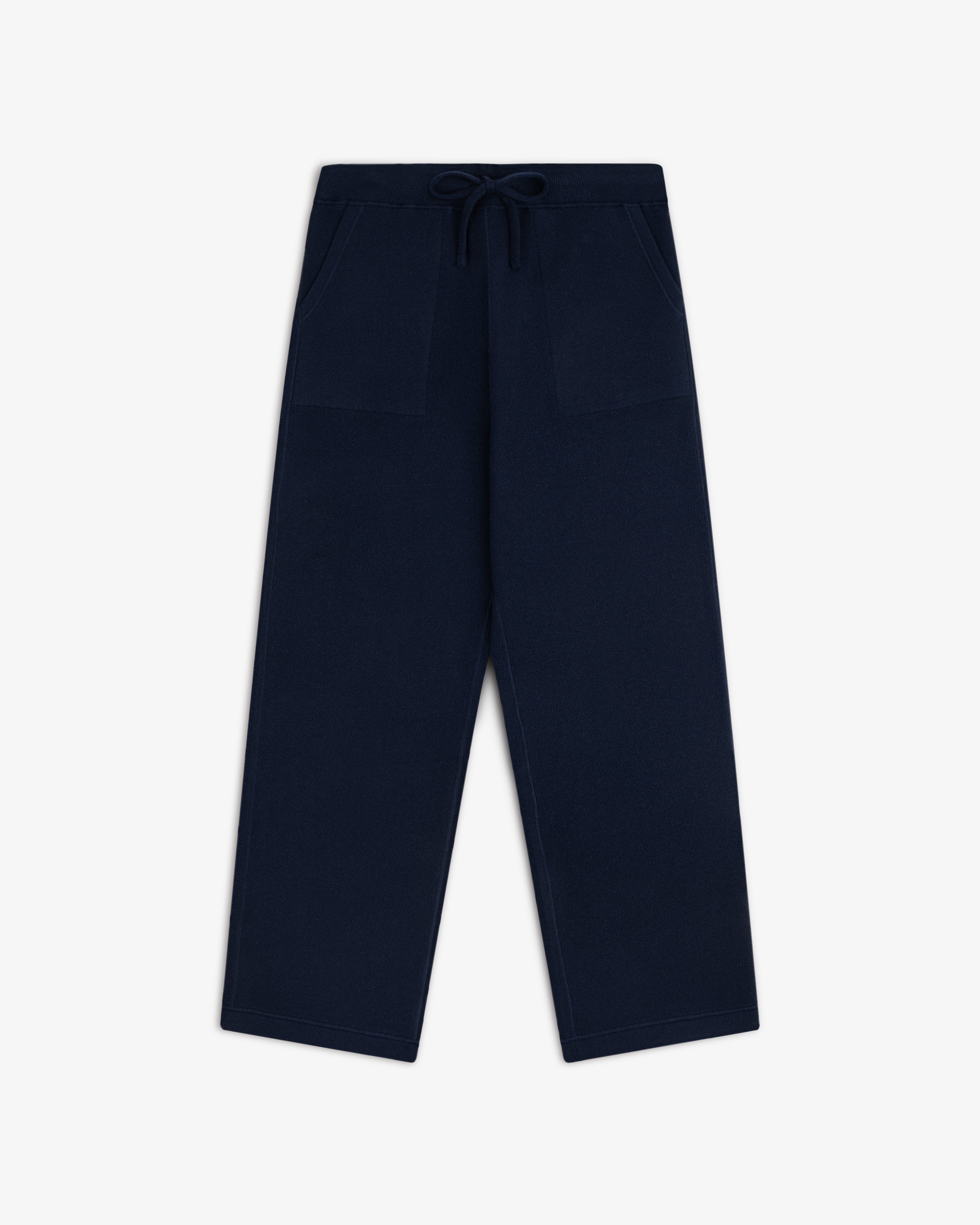 Pavilion Cashmere Sweatpant in navy, wide-leg with front pockets and drawstring waist, shown on white background.