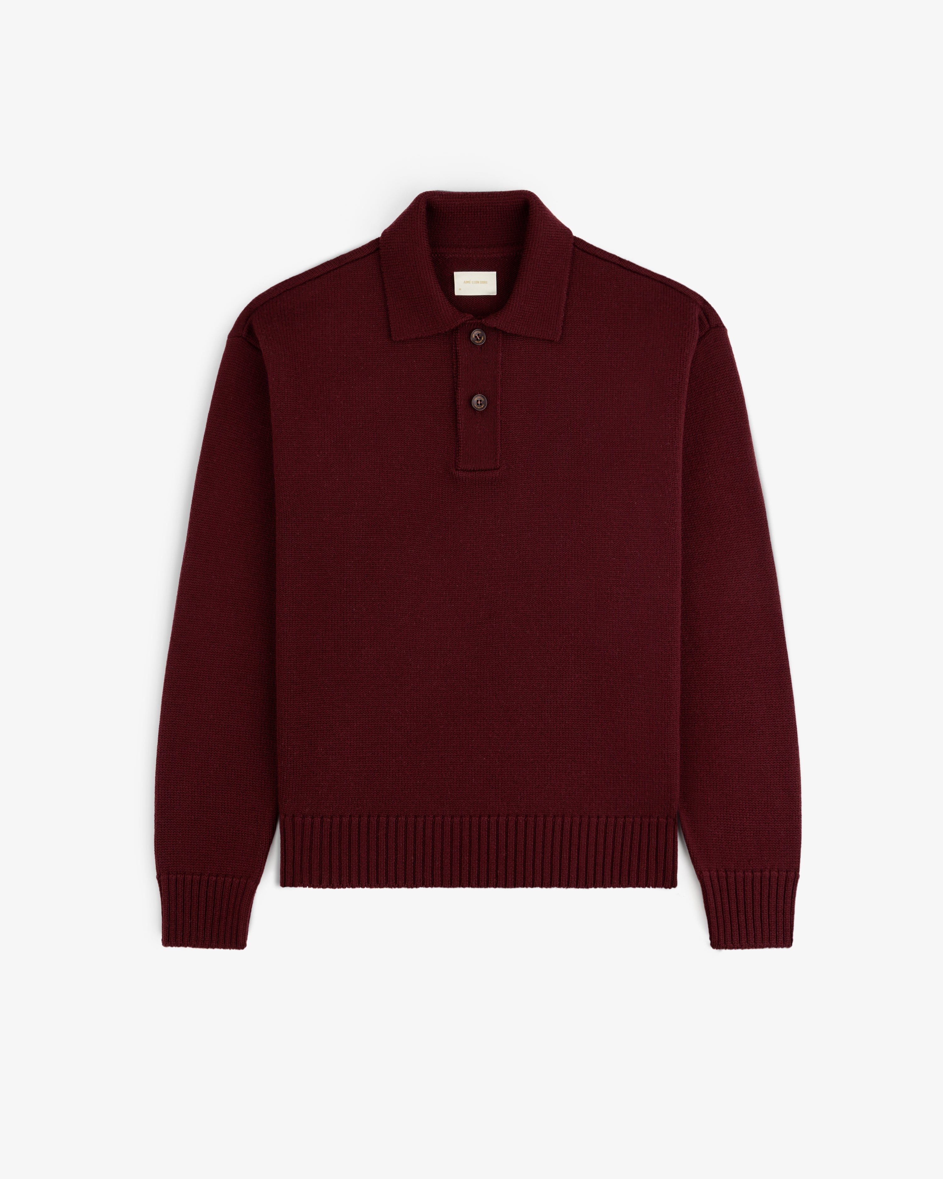 Maroon Long-Sleeve Merino Polo with a button placket and ribbed cuffs.