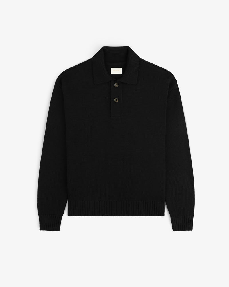 Long-Sleeve Merino Polo in black, featuring a three-button placket and ribbed cuffs and hem.