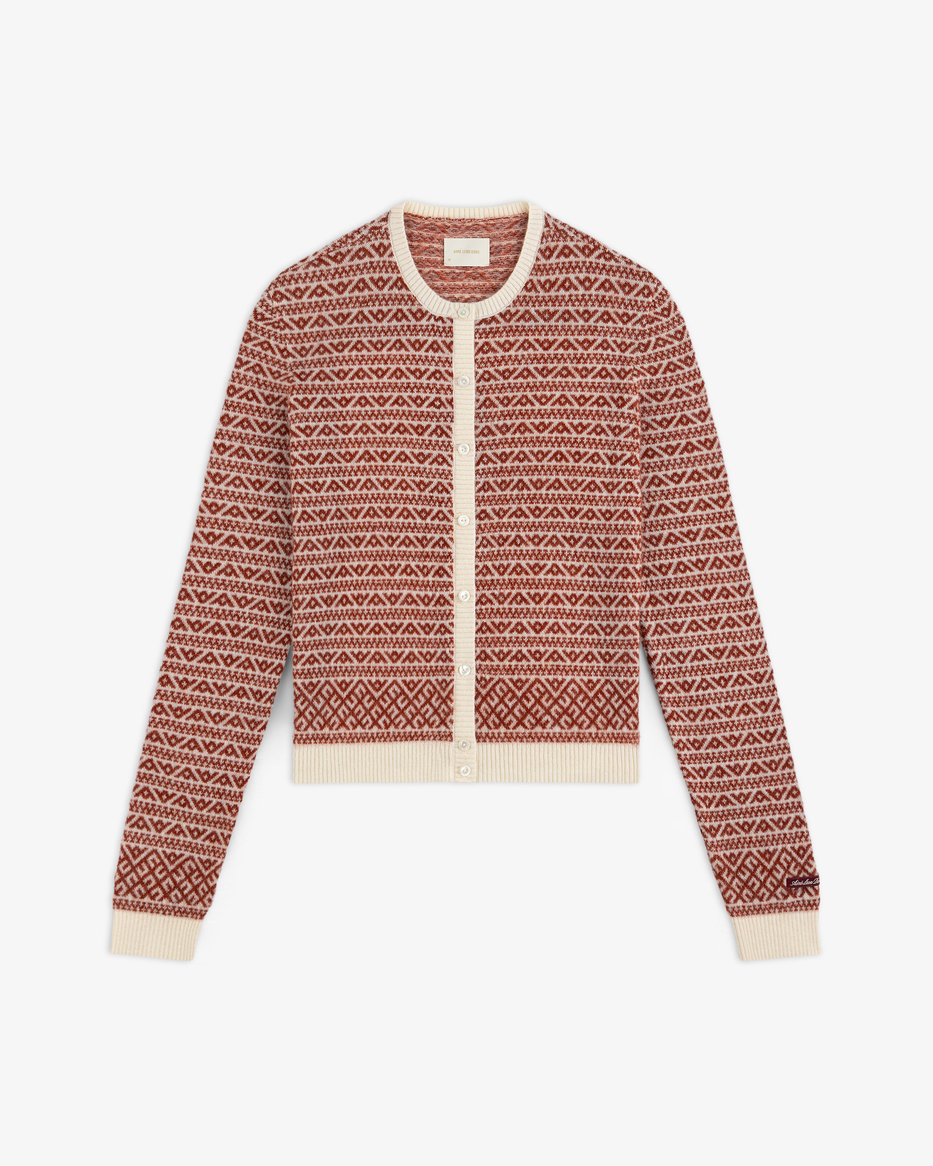 Wool Cashmere Jacquard Cardigan button-down with a red and cream geometric pattern and cream ribbed trim.