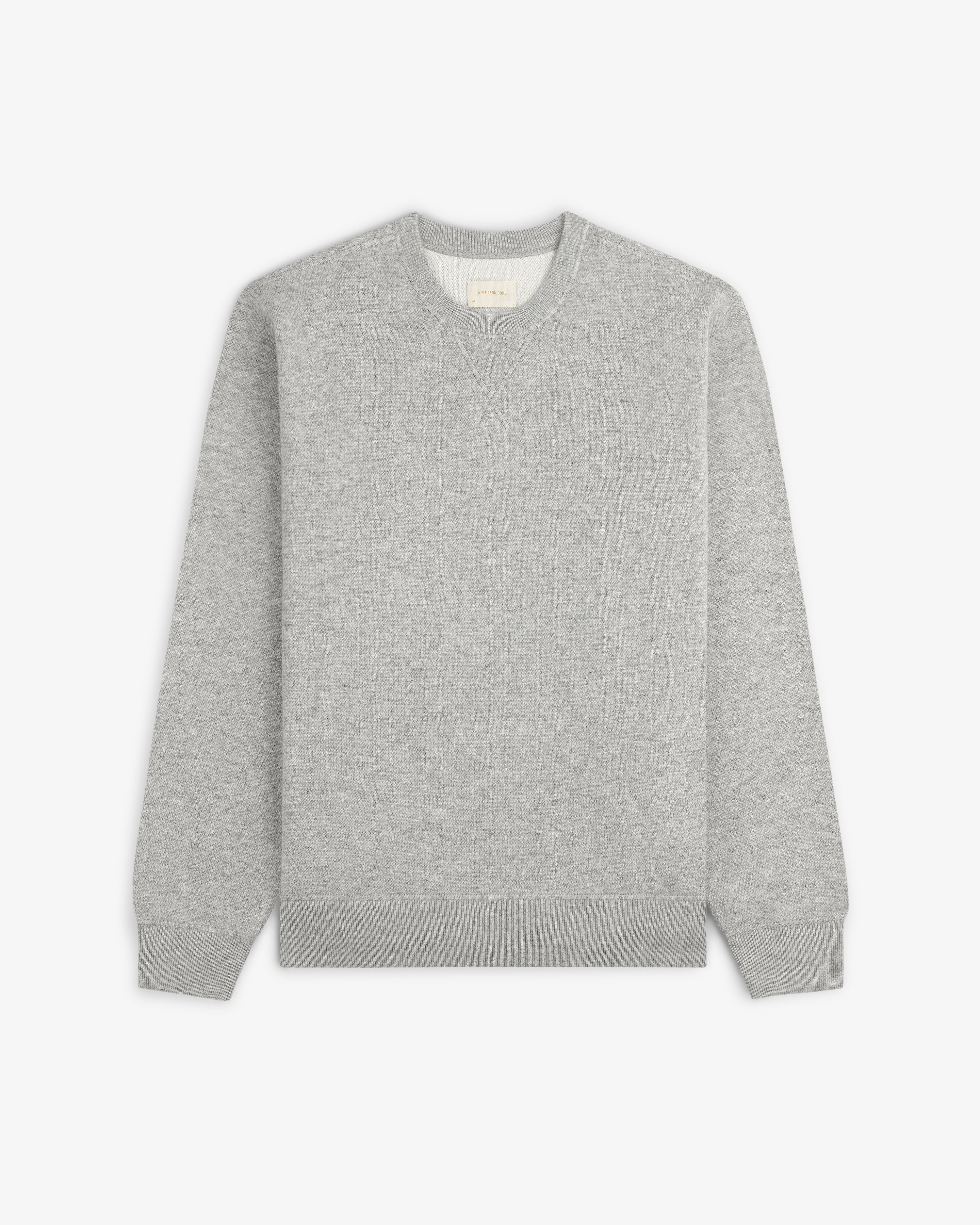 Pavilion Cashmere Crewneck Sweatshirt in light gray, long sleeves, ribbed cuffs/hem, shown flat on white background.