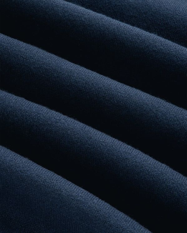 Close-up of Pavilion Cashmere Crewneck Sweatshirt in dark blue, featuring soft ridges and parallel textured lines.