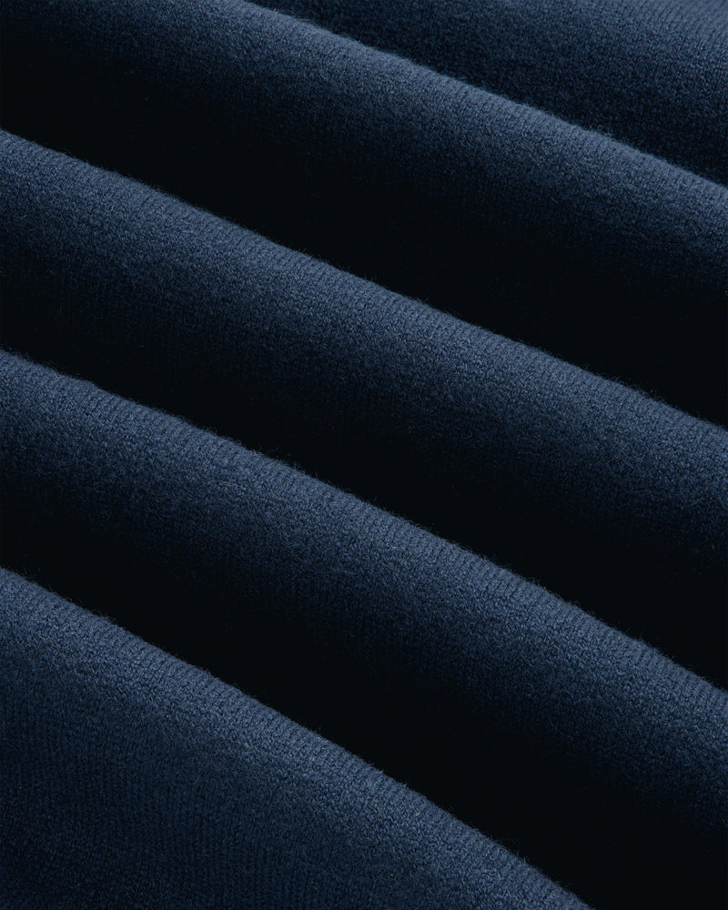Close-up of Pavilion Cashmere Crewneck Sweatshirt in dark blue, featuring soft ridges and parallel textured lines.