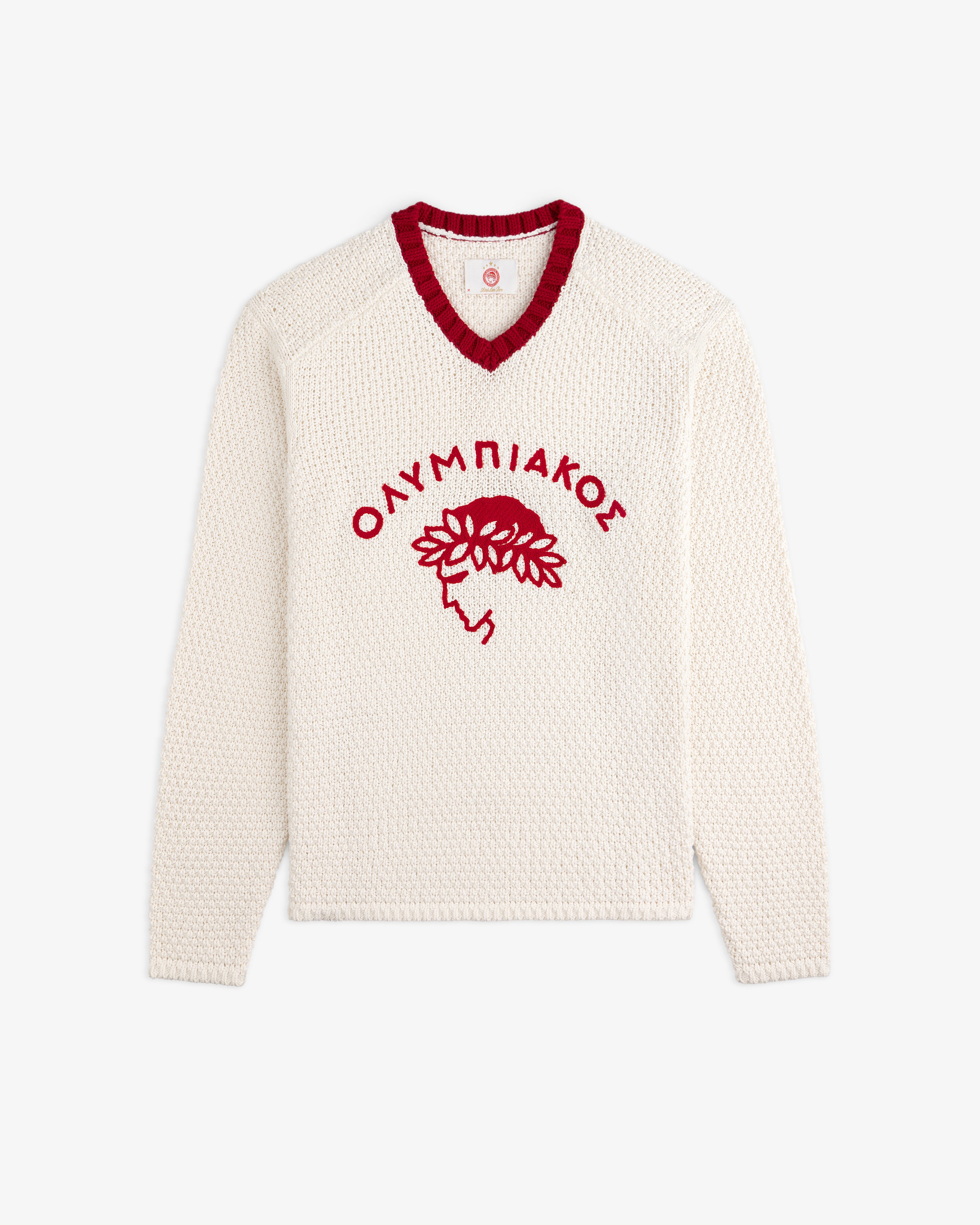ALD / Olympiacos F.C. Knit V-Neck Sweater in off-white with a red collar and a red laurel-crowned head emblem.