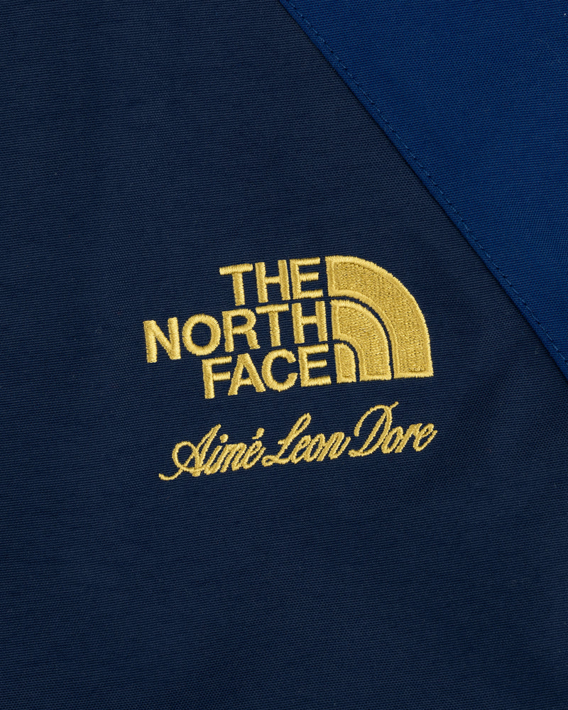 ALD/The North Face GORE-TEX 2000 Mountain Jacket with yellow logo embroidery on dark blue fabric.