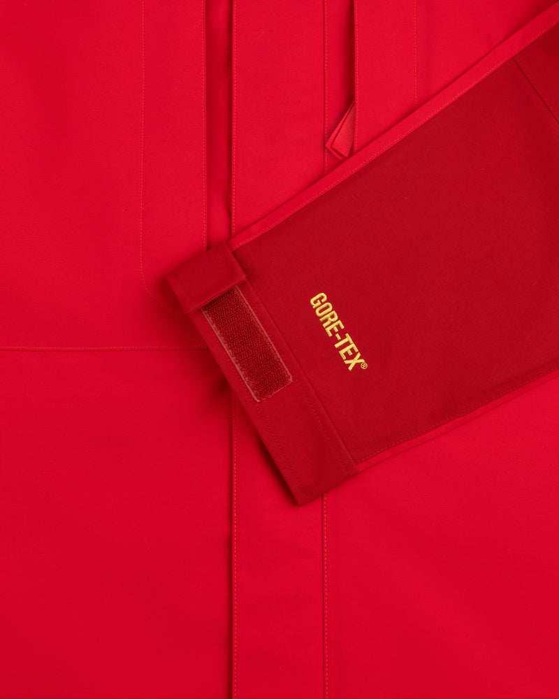 Close-up of ALD/The North Face GORE-TEX 2000 Mountain Jacket sleeve with yellow text and Velcro cuff strap.
