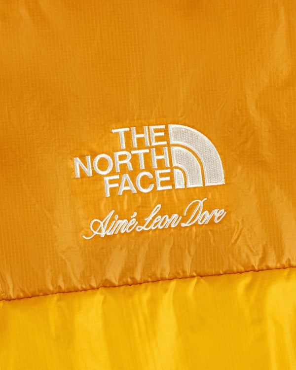 Yellow ALD / The North Face Reversible Pertex® Nuptse Jacket with white embroidered logos.