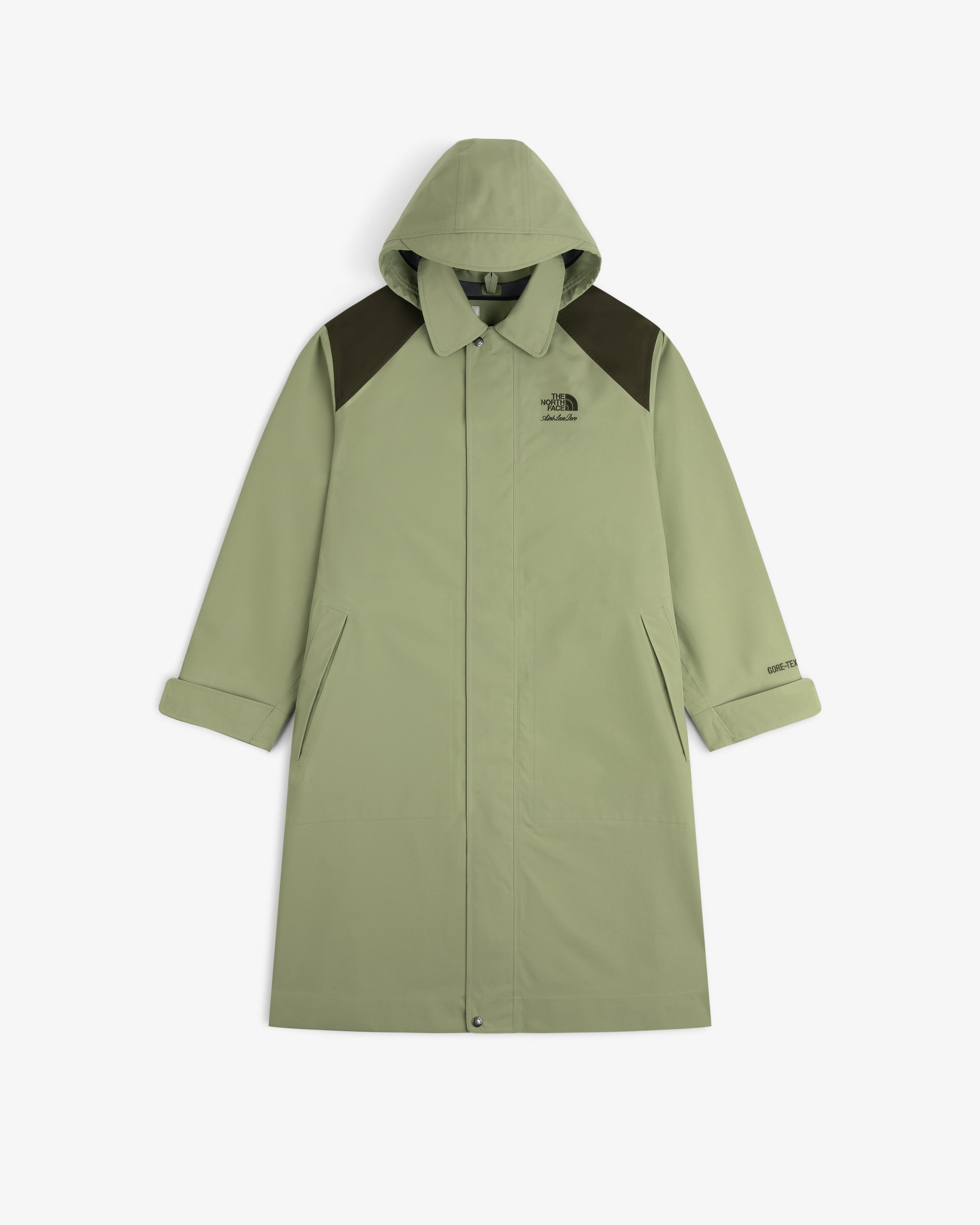 ALD/The North Face GORE-TEX Trench Coat in light green with dark shoulders, front buttons, and slanted pockets on white.