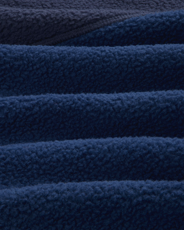 Close-up of navy blue ALD/The North Face ’95 Denali Half-Zip Fleece Pullover showing soft, fluffy texture.