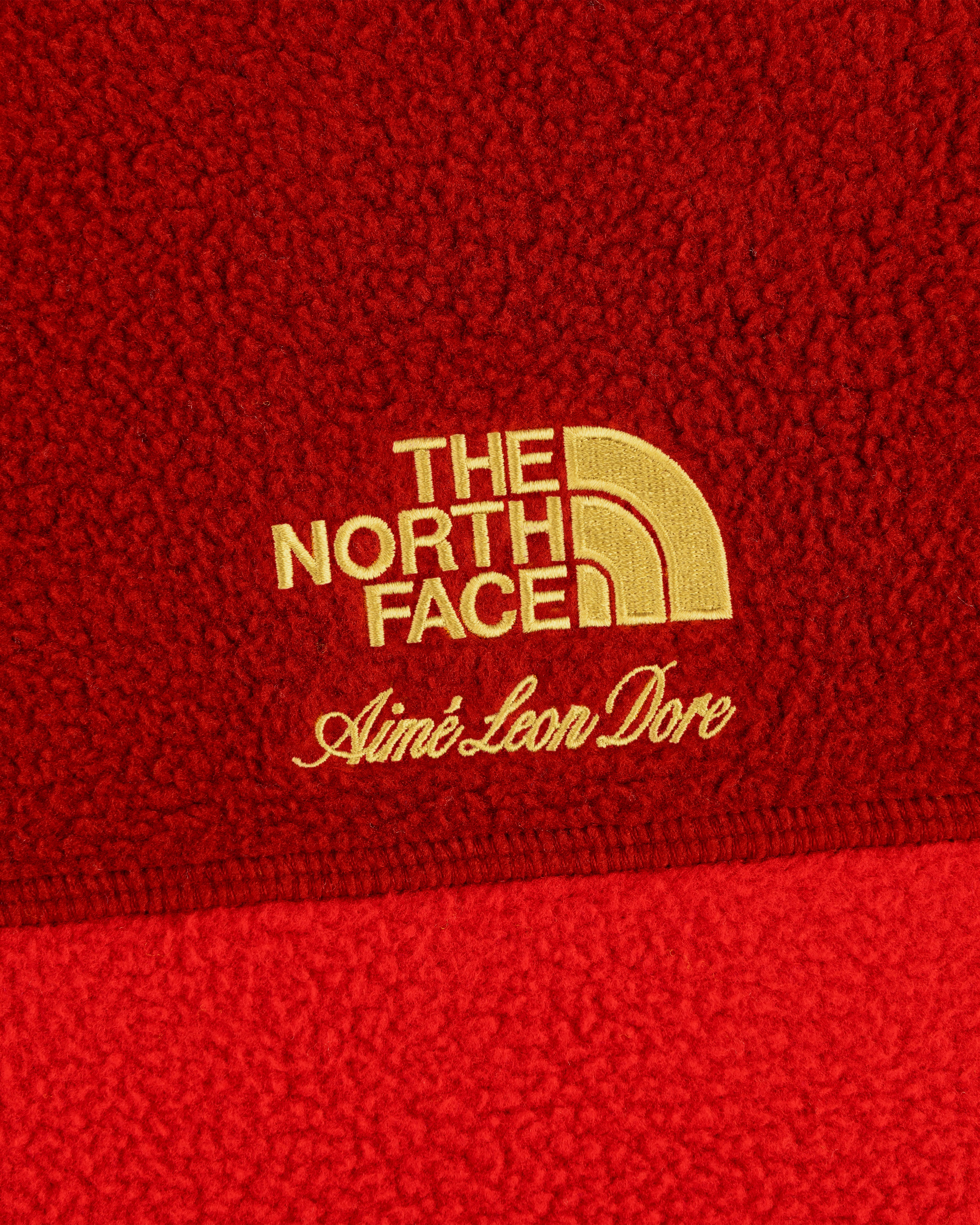 ALD/The North Face ’95 Denali Half-Zip Pullover in red with yellow embroidered logos.