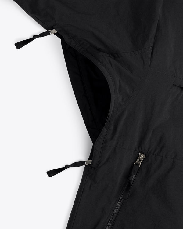 Close-up of the ALD / The North Face Nylon Denali Jacket with zippered side vent and pocket pull tabs.