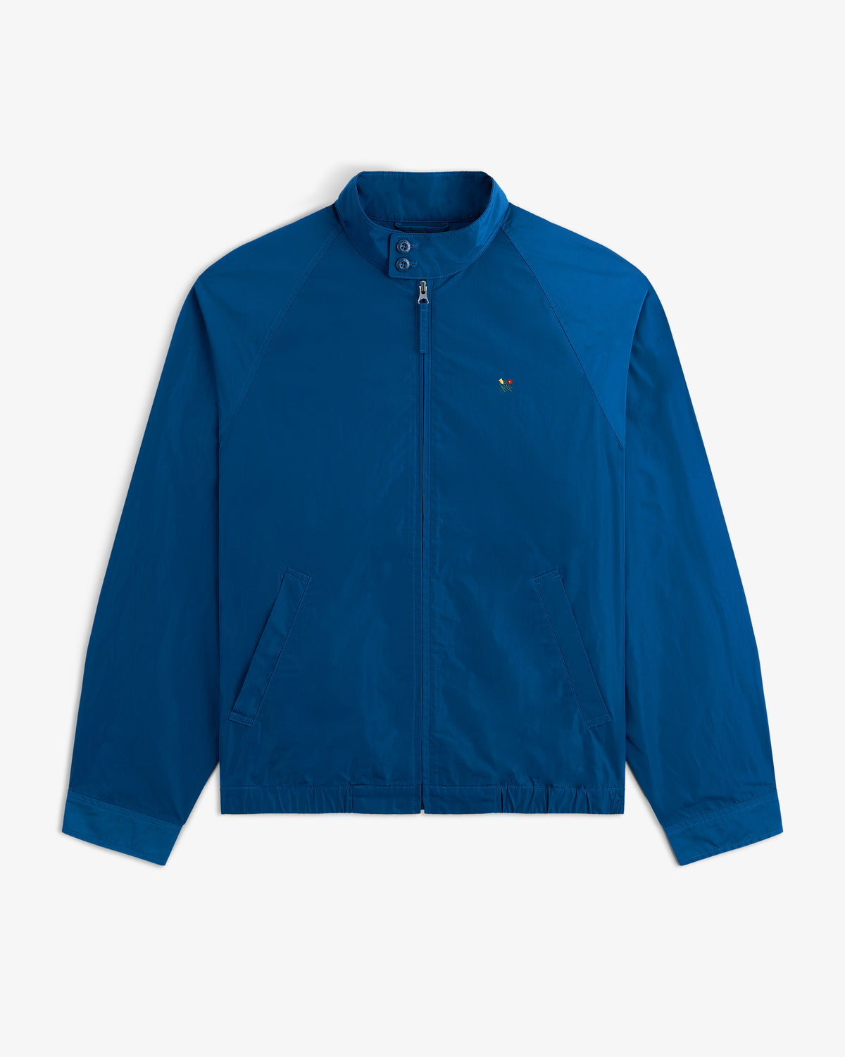 Crest Nylon Windbreaker in bright blue with stand collar, zip-up front, and two pockets on white background.
