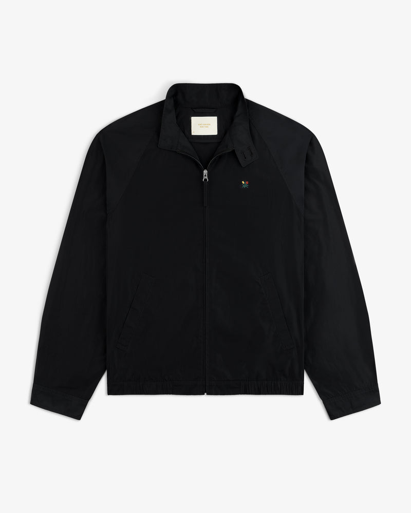 Crest Nylon Windbreaker: Black zip-up with side pockets, chest logo, and a straight collar.