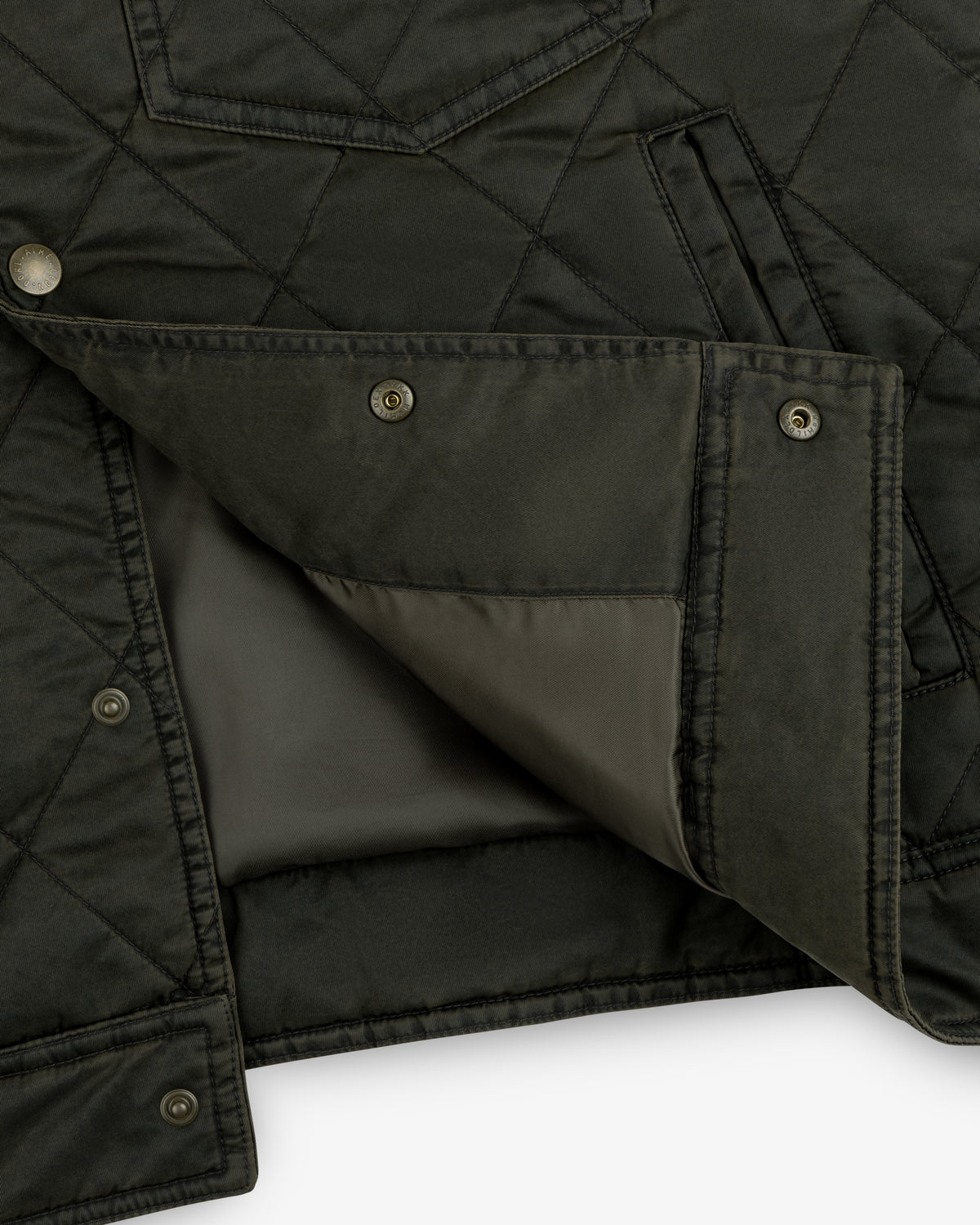 Dark olive Quilted Trucker Jacket with metal snap buttons and an open front placket.