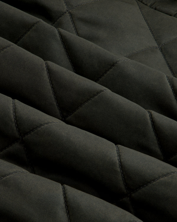 Dark green Quilted Trucker Jacket with a diamond-patterned quilted texture.