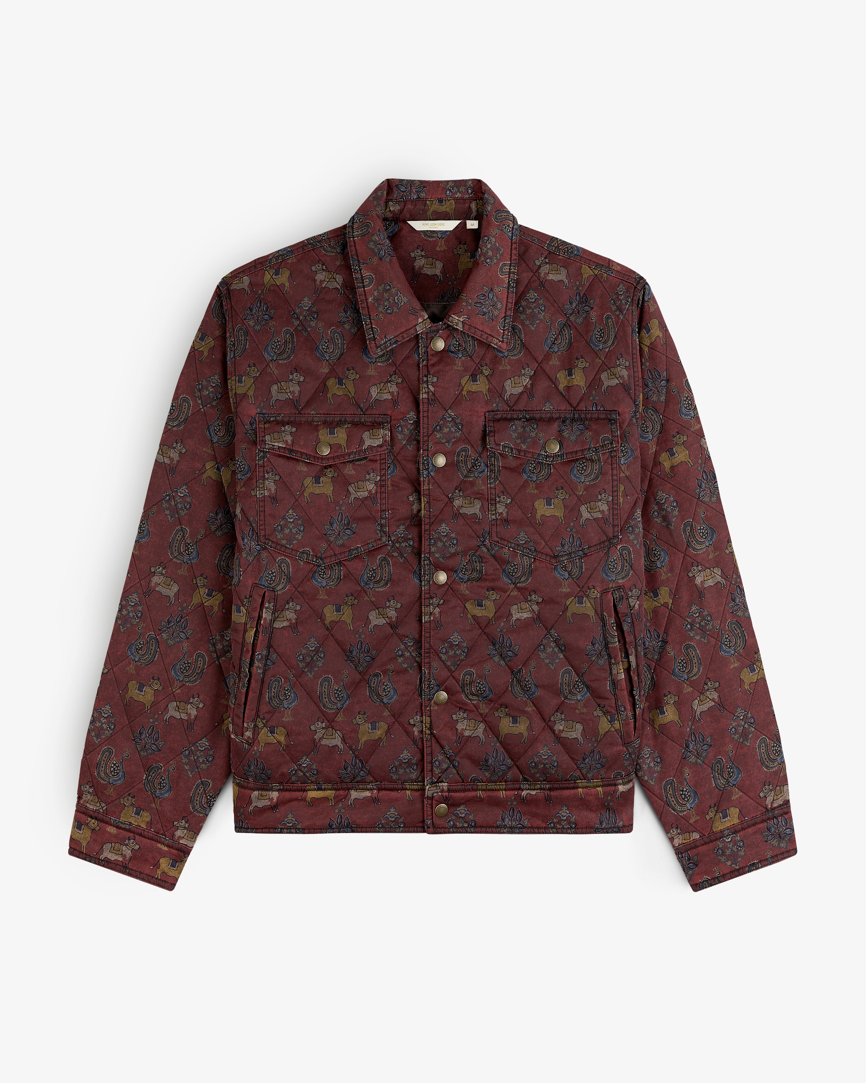 Quilted Trucker Jacket in burgundy with a repeating pattern of animals and paisley motifs.