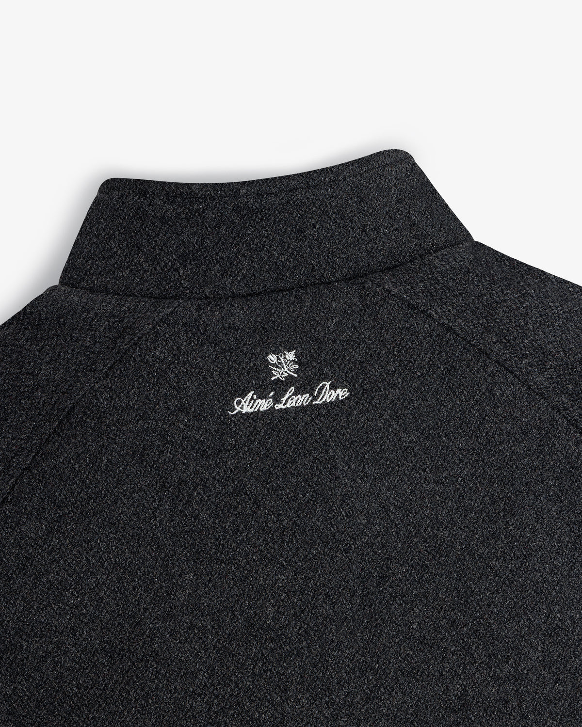 Back collar of the NY Highlanders Wool Varsity Jacket with Aimé Leon Dore and a small white crest embroidered.
