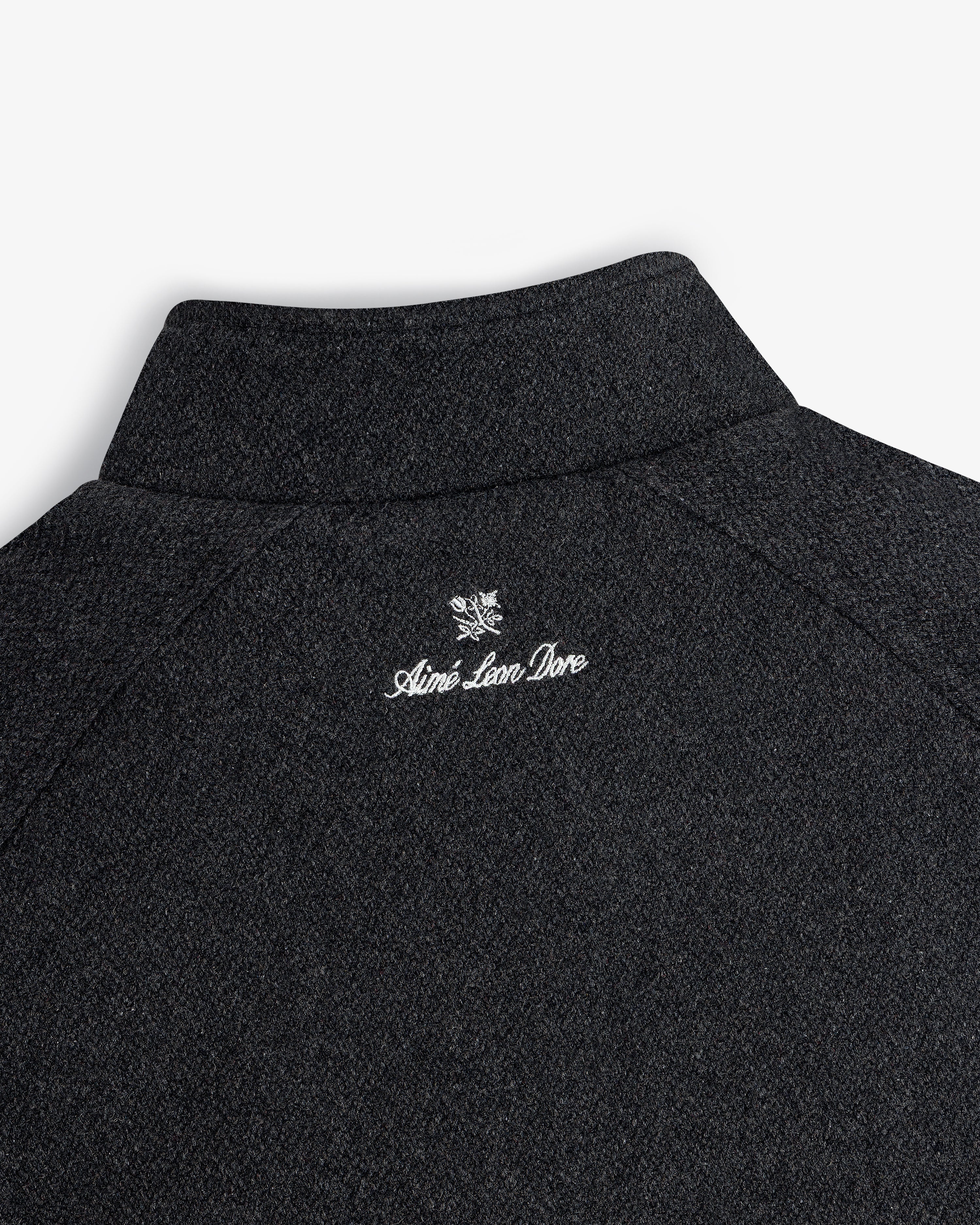 Back collar of the NY Highlanders Wool Varsity Jacket with Aimé Leon Dore and a small white crest embroidered.