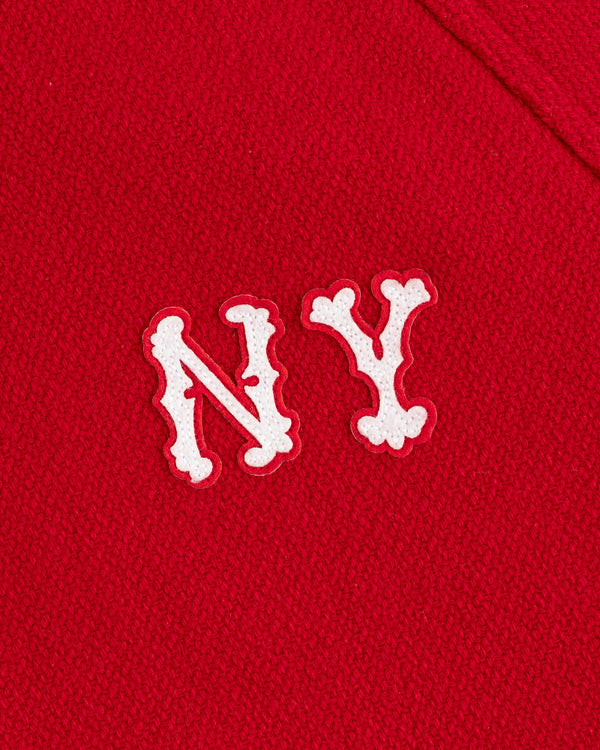 Bone-like white NY letters on red wool fabric—NY Highlanders Varsity Jacket.