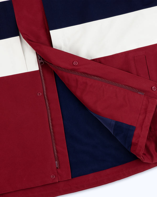 Close-up of the GORE-TEX Striped Sailing Jacket, partially unzipped to display its lining.