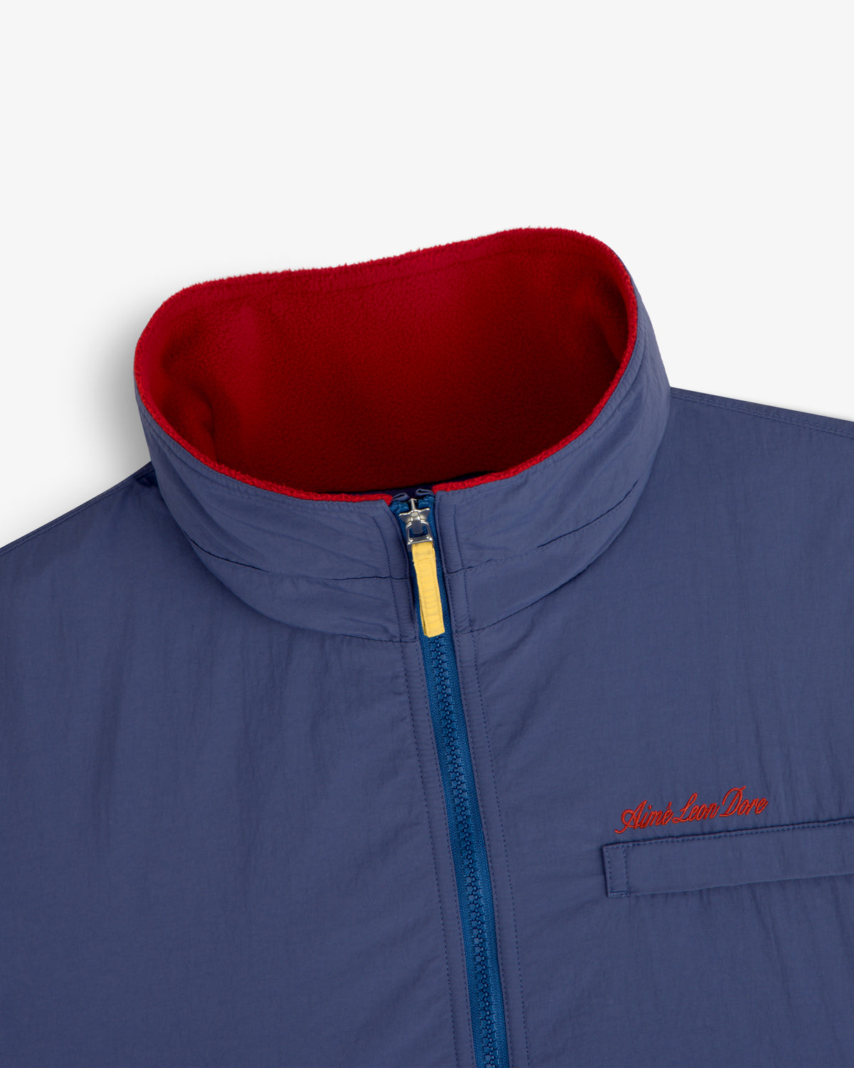 Fleece Lined Sport Windbreaker in blue with high collar, red fleece lining, and Atlantic Line Divn embroidery.