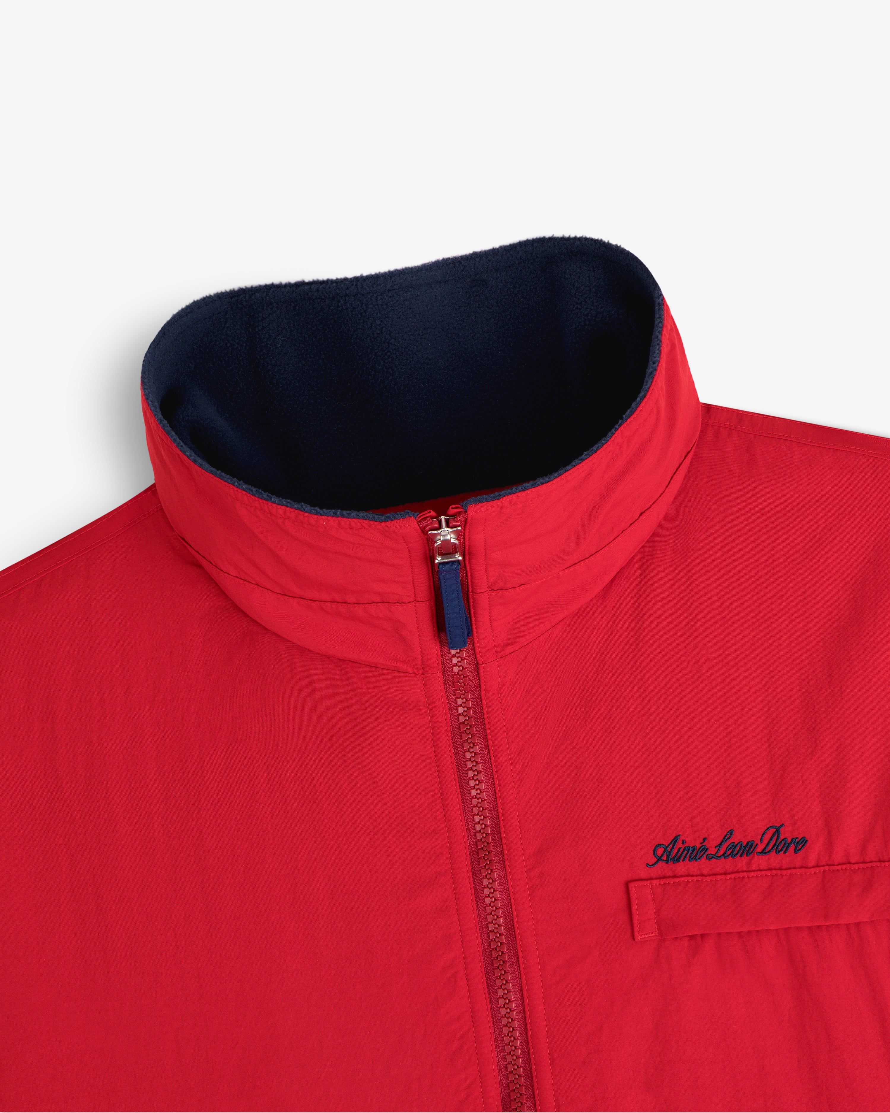 Fleece Lined Sport Windbreaker: red zip-up, high collar, navy lining, Atlantico Dove chest embroidery.