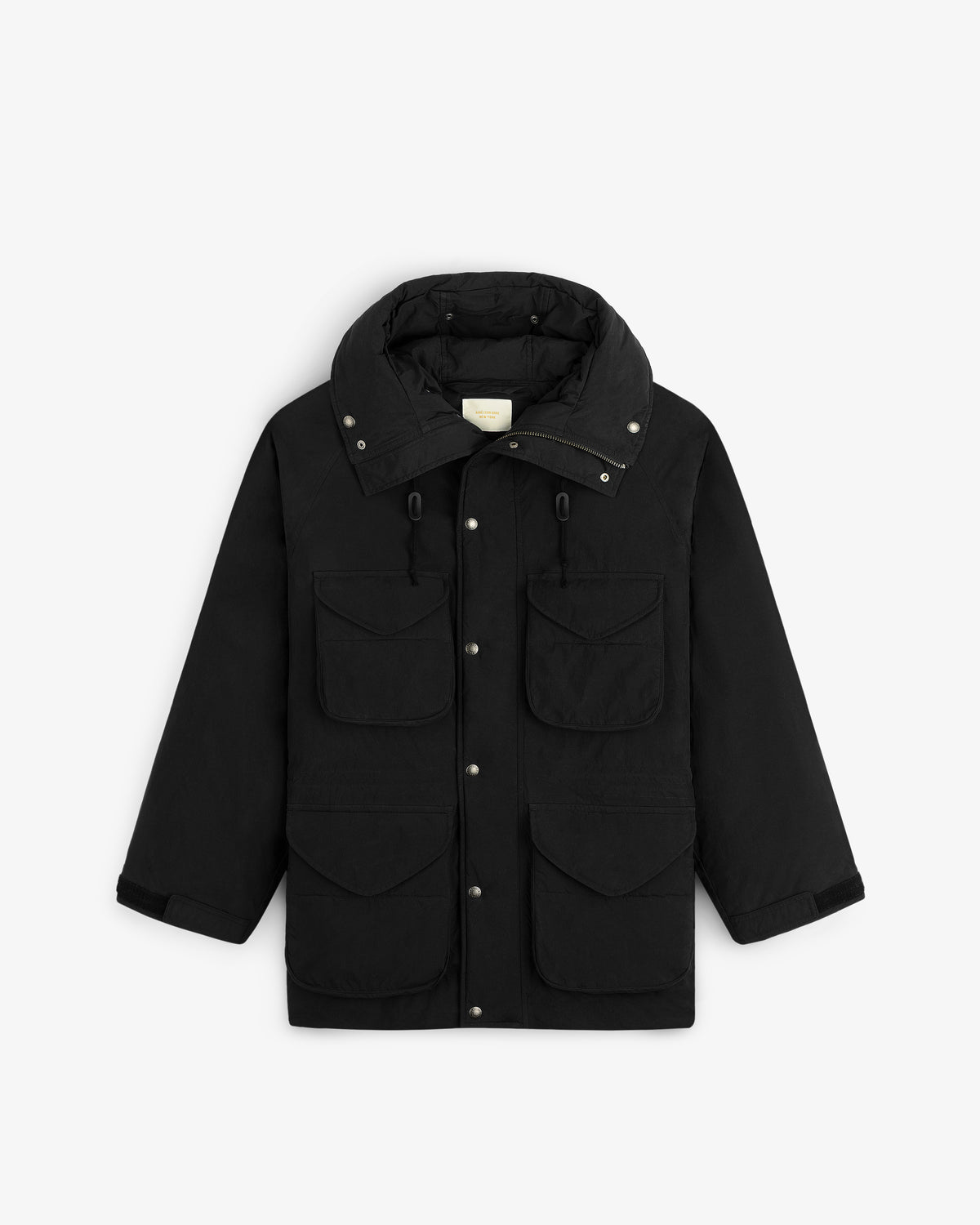 Down-Filled Surplus Parka: black hooded parka with a high collar, four front flap pockets, and a snap-button closure.