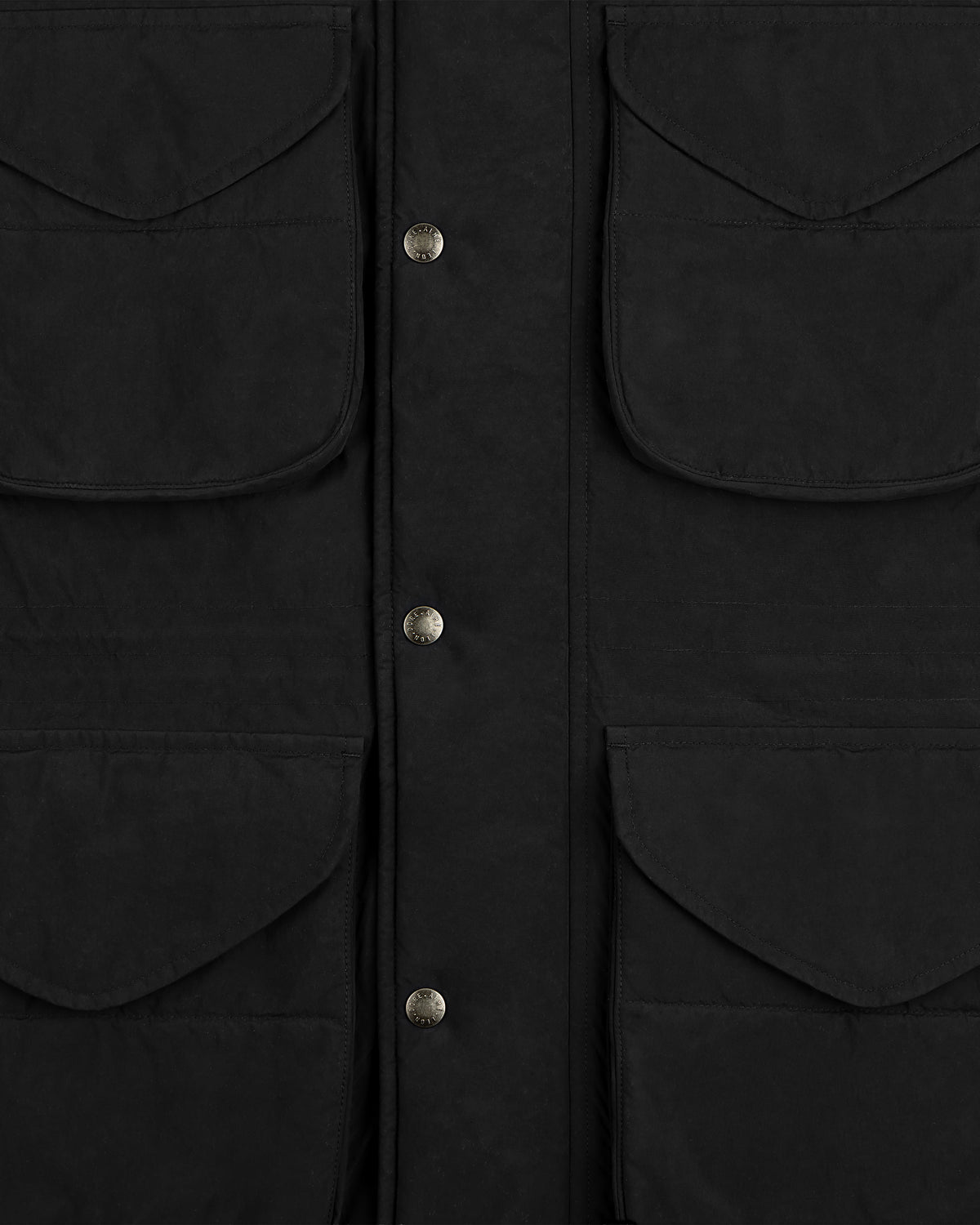 Close-up of a black Down-Filled Surplus Parka with four large flap pockets and a snap-button front closure.
