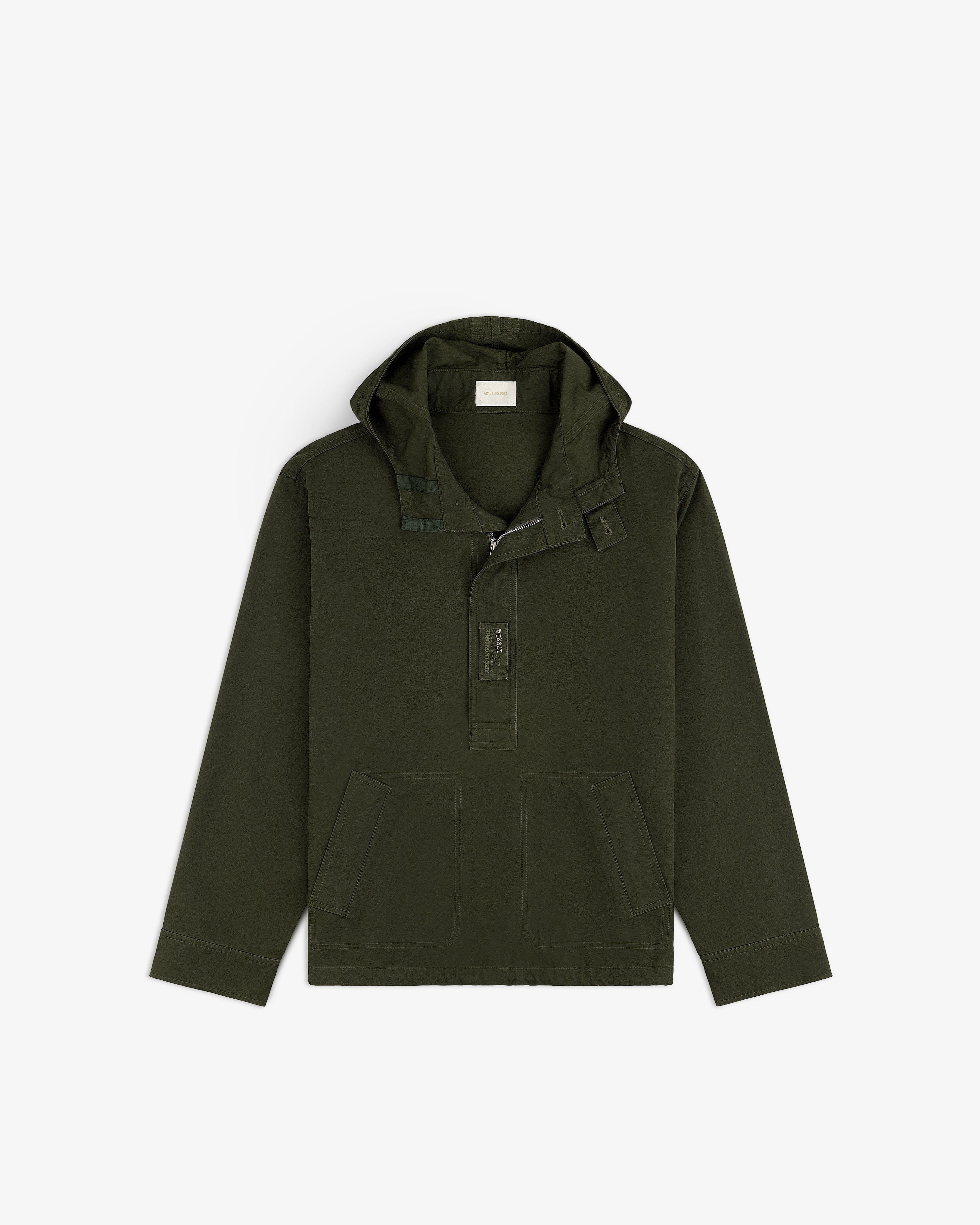 Garment Washed Anorak in dark olive green, featuring a long-sleeve hooded pullover design, half-zip, and two front pockets.