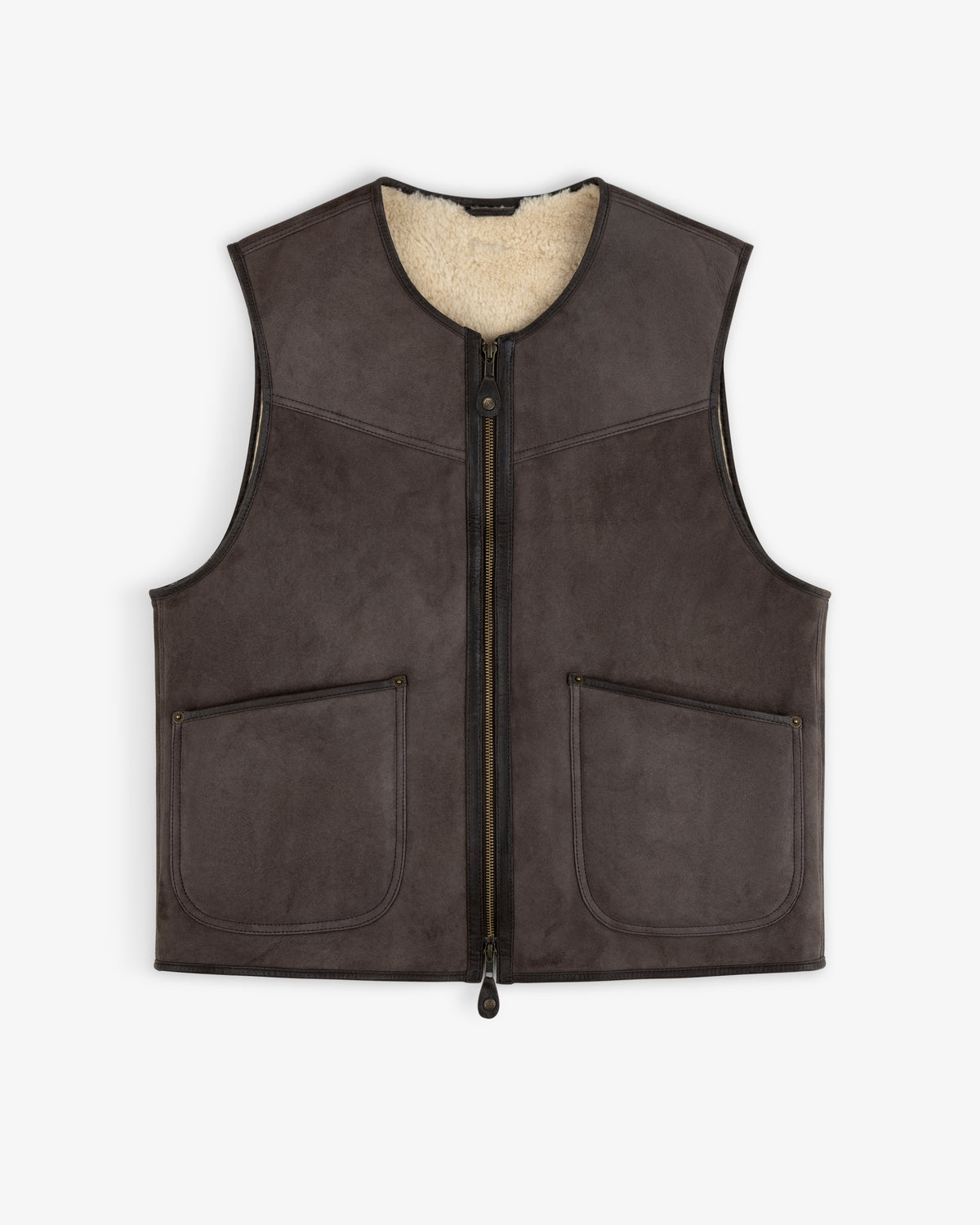 Shearling Biker Vest in dark brown suede with a cream shearling lining, front zipper, and two patch pockets.