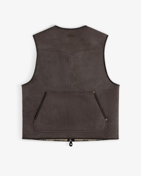 Back view of a dark brown Shearling Biker Vest with a large front pocket and a zippered closure.