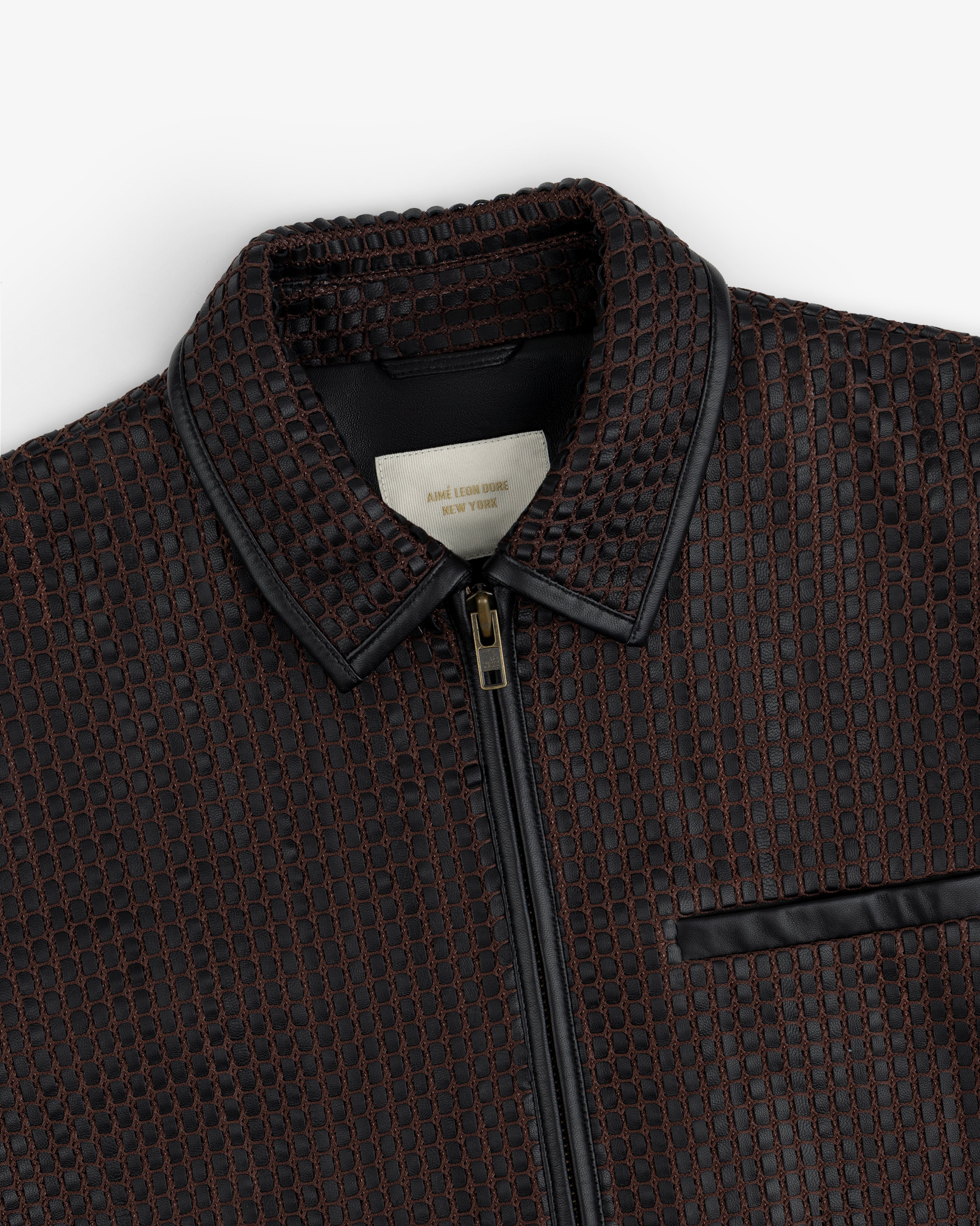Woven Leather Jacket in brown with a grid-patterned texture, black leather collar, and a front zipper.