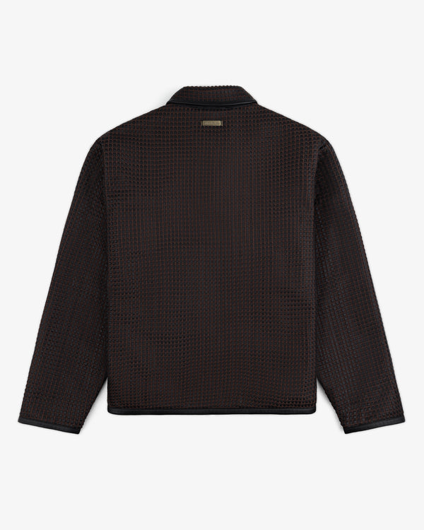 Back view of a Woven Leather Jacket with a dark, grid-patterned woven texture and a collar.