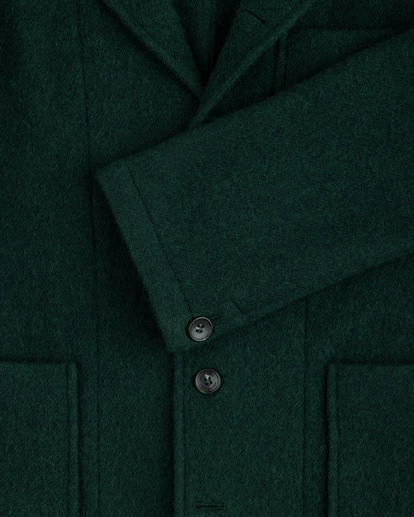 Dark green textured Wool Sport Coat with notched lapels, patch pockets, and dark buttons.