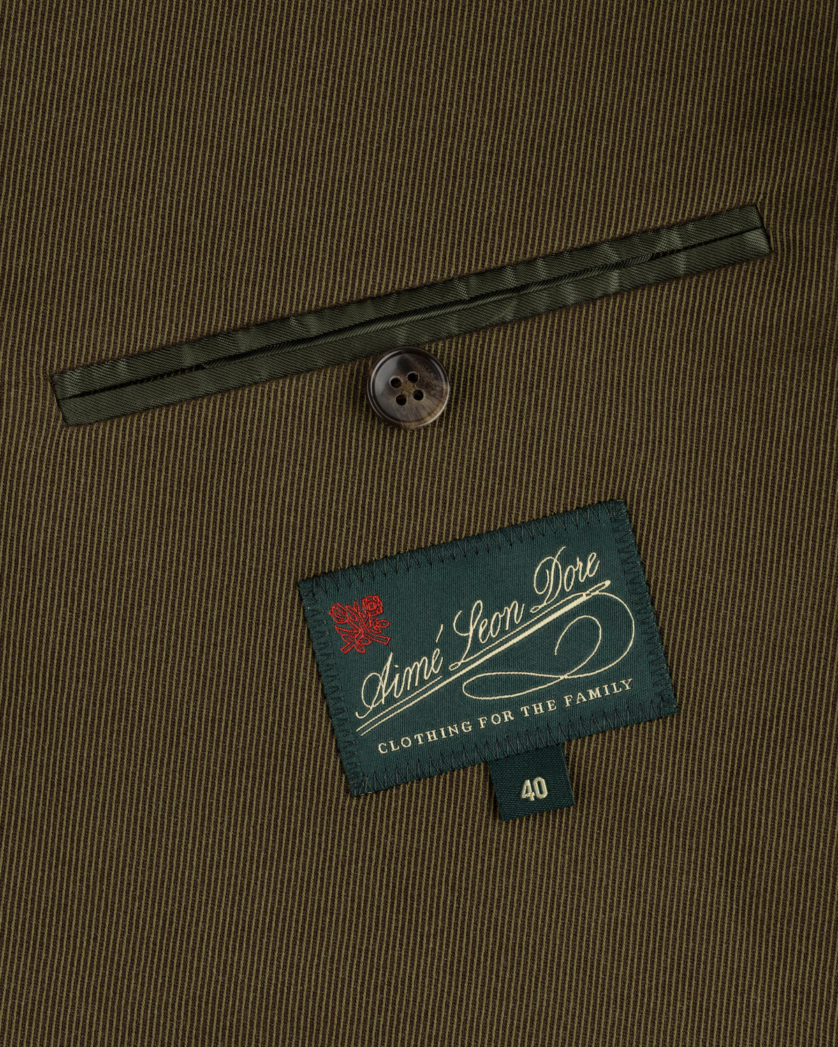 Olive green Single-Breasted Wool Blend Suit Jacket featuring a button, pocket welt, and a size 40 branded interior label.